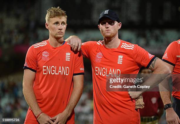 Joe Root and Ben Stokes of England react after losing the ICC World Twenty20 India 2016 Final between England and the West Indies at Eden Gardens on...
