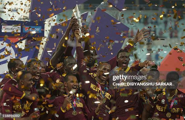 West Indies's players celebrate after victory in the World T20 cricket tournament final match between England and West Indies at The Eden Gardens...
