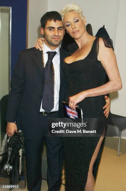 Actress Brigitte Nielsen and guest arrive at the "British Comedy Awards 2004" at London Television Studios on December 22, 2004 in London. Jonathan...