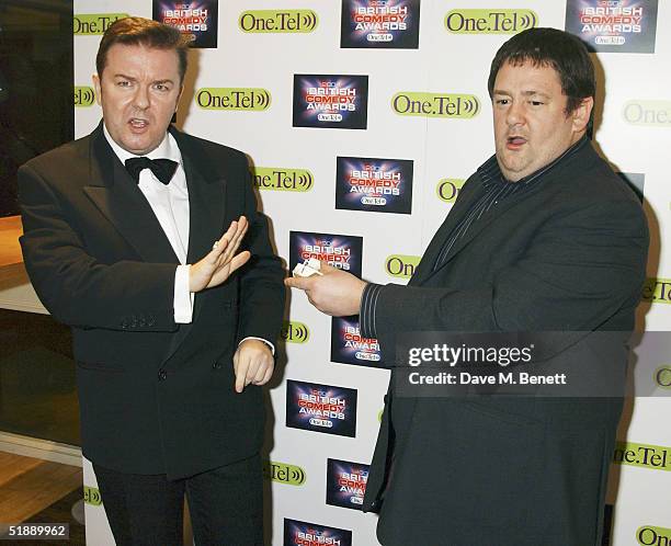 Comedians Ricky Gervais and Johnny Vegas arrive at the "British Comedy Awards 2004" at London Television Studios on December 22, 2004 in London....