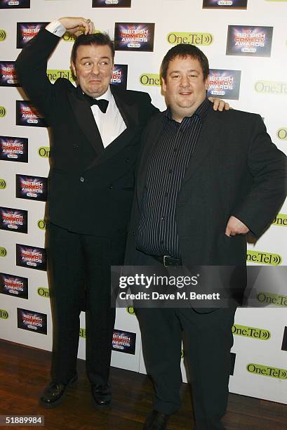 Comedians Ricky Gervais and Johnny Vegas arrive at the "British Comedy Awards 2004" at London Television Studios on December 22, 2004 in London....