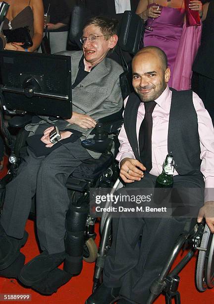 Scientist Stephen Hawkings and TV producer Ash Atalla arrive at the "British Comedy Awards 2004" at London Television Studios on December 22, 2004 in...