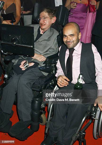 Scientist Stephen Hawkings and TV producer Ash Atalla arrive at the "British Comedy Awards 2004" at London Television Studios on December 22, 2004 in...