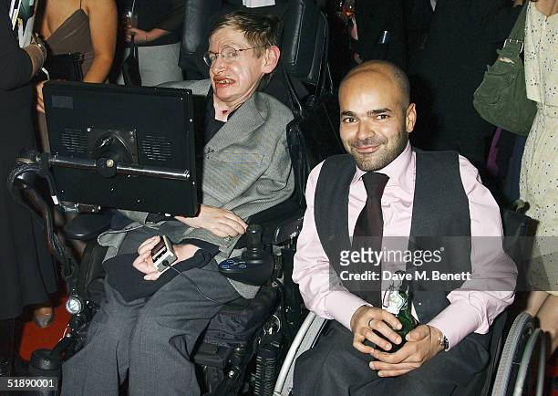 Scientist Stephen Hawkings and TV producer Ash Atalla arrive at the "British Comedy Awards 2004" at London Television Studios on December 22, 2004 in...