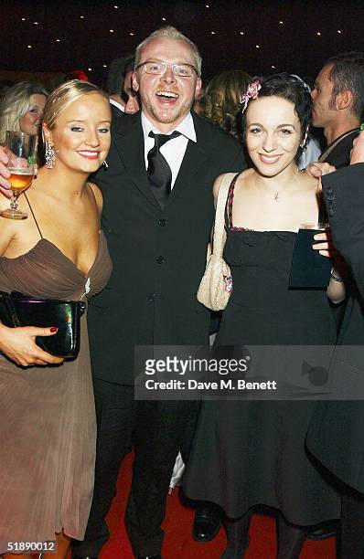 Actors Lucy Davis, Simon Pegg and guest arrive at the "British Comedy Awards 2004" at London Television Studios on December 22, 2004 in London....