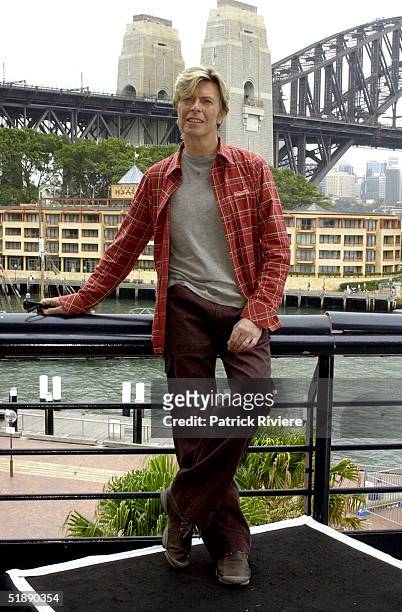 February 2004 - English singer David Bowie attends a photocall for his "Reality Tour" at the Quay Restaurant in Sydney, Australia.