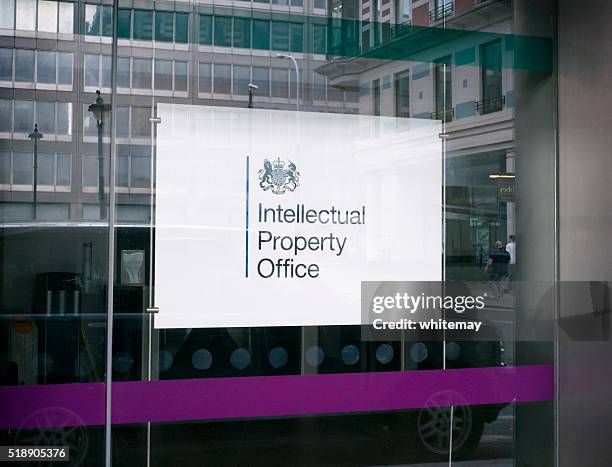 señal de propiedad intelectual de oficina - propiedad intelectual fotografías e imágenes de stock