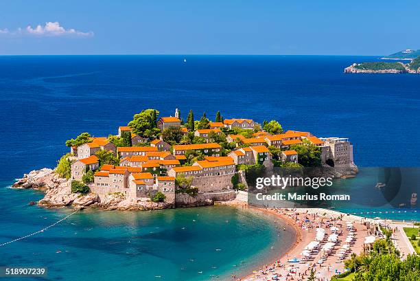 view of sveti stefan resort-island, montenegro. - isthmus stock-fotos und bilder