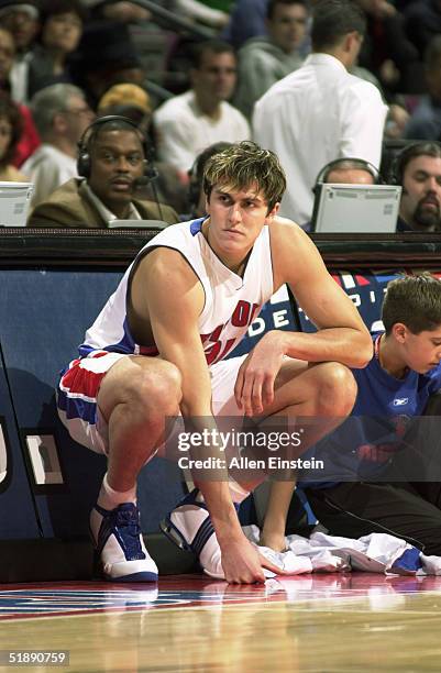 Darko Milicic of the Detroit Pistons waits to enter the game against the Toronto Raptors on December 8, 2004 at the Palace of Auburn Hills, in Auburn...