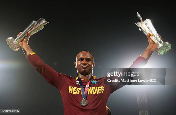 Marlon Samuels of the West Indies celebrates his teams win after defeating England during the ICC World Twenty20 India 2016 Final between England and...