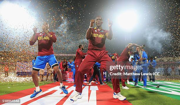 Darren Sammy, Captain of the West Indies celebrates his teams win after defeating England with Dwayne Bravo of the West Indies during the ICC World...