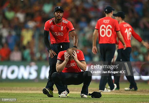 Ben Stokes of England is comforted by Chris Jordan during the ICC World Twenty20 India 2016 final match between England and West Indies at Eden...