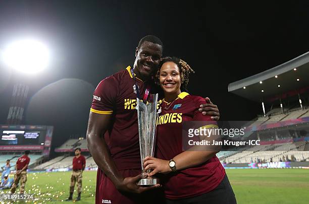 Carlos Brathwaite of the West Indies poses with partner Jessica Felix during the ICC World Twenty20 India 2016 final match between England and West...