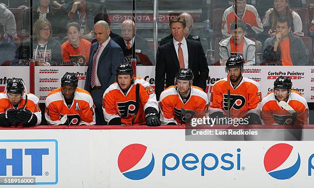 Brayden Schenn, Wayne Simmonds, Assistant Coach Ian Laperriere, Ryan White, Chris VandeVelde, Head Coach Dave Hakstol, Pierre-Edouard Bellemare and...