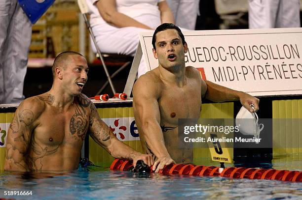 Florent Manaudou and Frederick Bousquet of France react after Florent Manaudou's victory in the 50m Men's freestyle final on day six of the French...