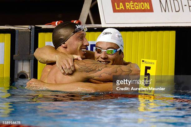 Florent Manaudou and Frederick Bousquet of France react after Florent Manaudou's victory in the 50m Men's freestyle final on day six of the French...