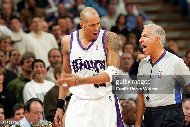 Doug Christie of the Sacramento Kings argues with official Bennett Salvatore during a game against the Miami Heat on December 23 at Arco Arena in...