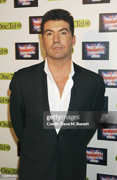 Presenter Simon Cowell arrives at the "British Comedy Awards 2004" at London Television Studios on December 22, 2004 in London. Jonathan Ross hosted...