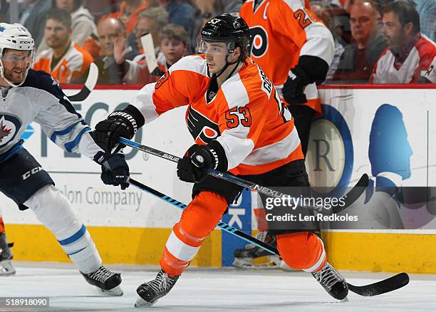 Shayne Gostisbehere of the Philadelphia Flyers in action against Matt Halischuk of the Winnipeg Jets on March 28, 2016 at the Wells Fargo Center in...