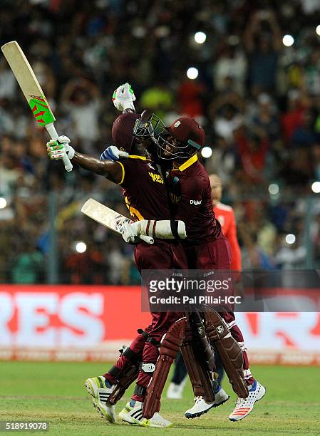 Carlos Brathwaite of the West Indies and Marlon Samuels of the West Indies celebrate after hitting the winnign run during ICC World Twenty20 India...