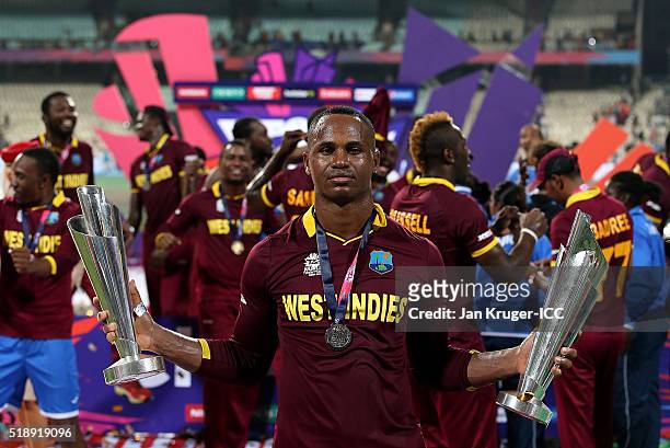 Marlon Samuels of the West Indies poses with the player of the match trophy during the ICC World Twenty20 India 2016 final match between England and...