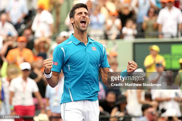 Novak Djokovic of Serbia celebrates his win over Kei Nishikori of Japan during the final on Day 14 of the Miami Open presented by Itau at Crandon...