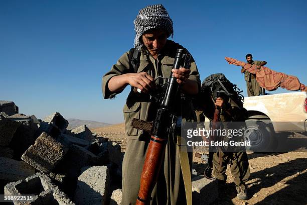 Norther Iraq - Makhmur 08 October : Female fighters of the Kurdistan Workers Party PKK on the frontline with ISIL in tourtskirts of the village of...