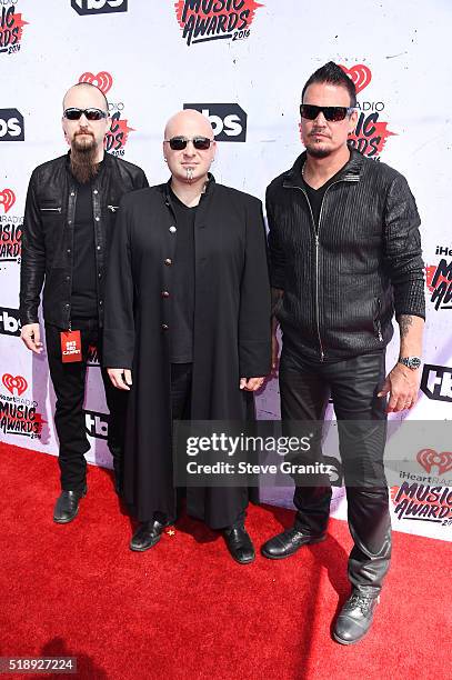 Musicians Mike Wengren, David Draiman and Dan Donegan attend the iHeartRadio Music Awards at The Forum on April 3, 2016 in Inglewood, California.