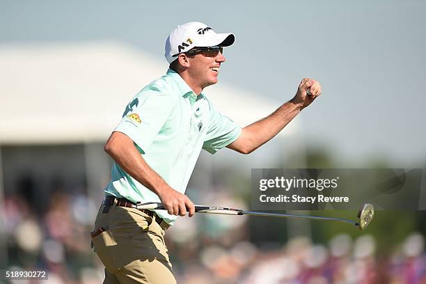 Jim Herman of the United States celebrates his victory on the 18th green during the final round of the Shell Houston Open at the Golf Club of...