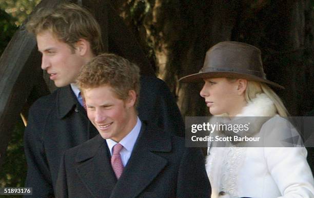 Britain's Prince William, Prince Harry and Zara Phillips, daughter of Princes Anne, leave after attending the Christmas Day service at Sandringham...