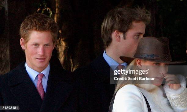 Britain's Prince Harry, Prince William and Zara Phillips leave after attending the Christmas Day service at Sandringham Church, King's Lynn on...