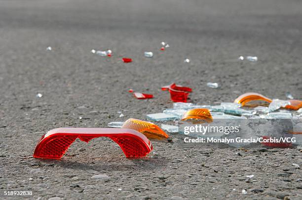 shattered car lights on ground - rear light car stock pictures, royalty-free photos & images