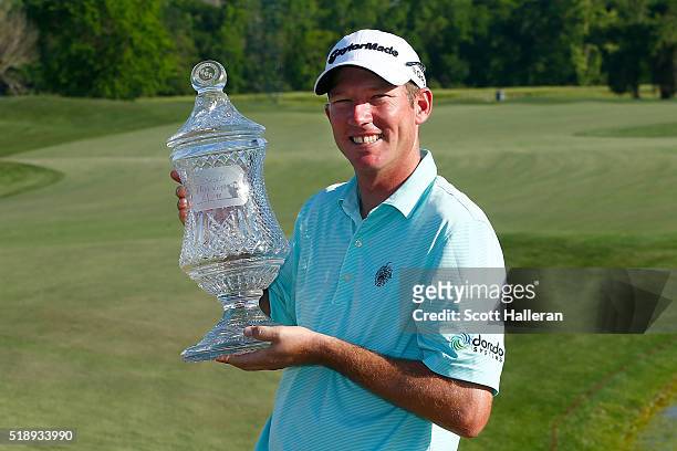 Jim Herman of the United States poses with the trophy after his victory at the Shell Houston Open at the Golf Club of Houston on April 3, 2016 in...