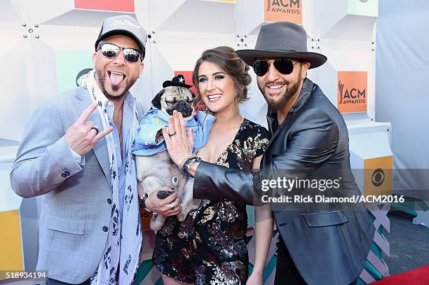Recording artist Chris Lucas of LOCASH, Doug the Pug and owner Leslie Mosier and recording artist Preston Brust of LOCASH attend the 51st Academy of...