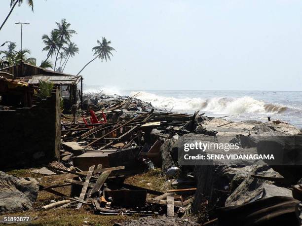 The trail of destruction along the coastal railway line in the southern Sri Lankan town of Lunawa is seen in this picture taken 26 December 2004...