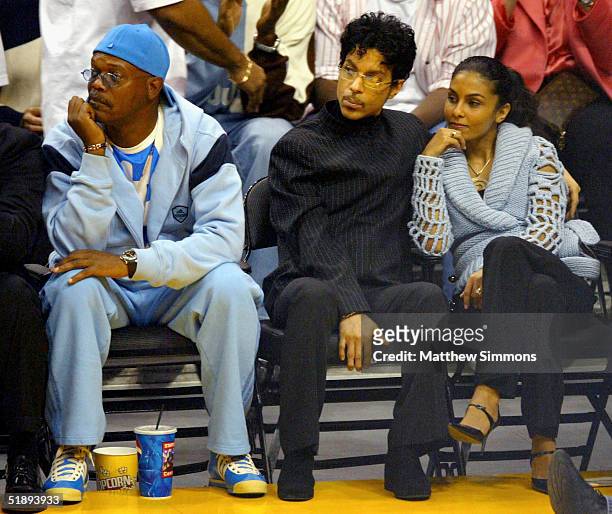Actor Samuel L. Jackson, Musician Prince and wife Manuela Testolini watch the Los Angeles Lakers game against the Miami Heat at the Staples Center...