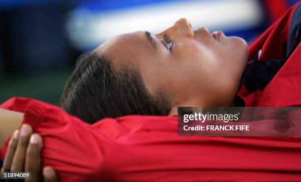 Foto tomada el 27 de agosto de 2004 de la atleta estadounidense Marion Jones, durante los preparativos para la competencia final de salto largo en...