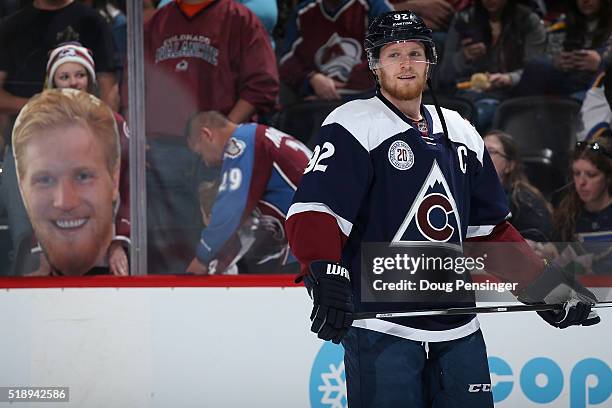 Gabriel Landeskog of the Colorado Avalanche warms up infront of a portrait of himself displayed by a fan prior to facing the St. Louis Blues at Pepsi...