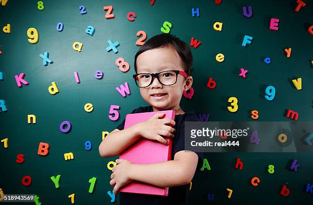 cute asia children - number magnet stock pictures, royalty-free photos & images