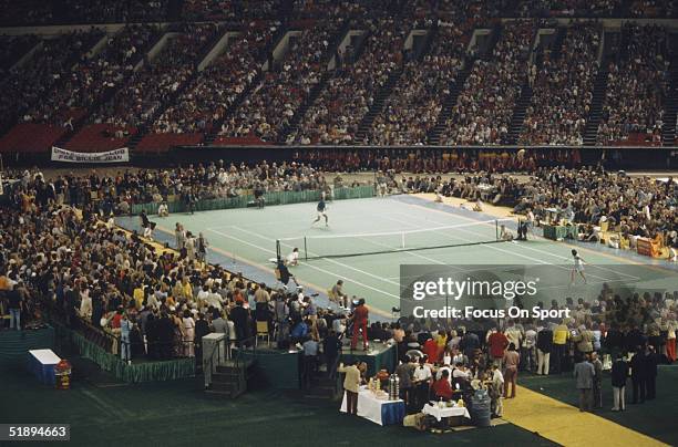 Billie Jean King in a match against Bobby Riggs in front of 30,472 spectators at the Houston Astrodome on September 20, 1973 in Houston, Texas. King...