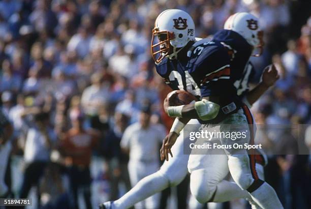 Running back Bo Jackson of the Auburn Tigers runs with the ball during a game in the 1980's.
