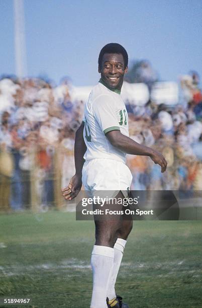 New York Cosmos' Pele walks across the field.