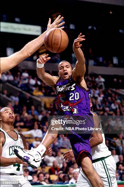 Damon Stoudamire of the Toronto Raptors makes a pass against the Boston Celtics during the NBA game in Boston, Masachussetts. NOTE TO USER: User...