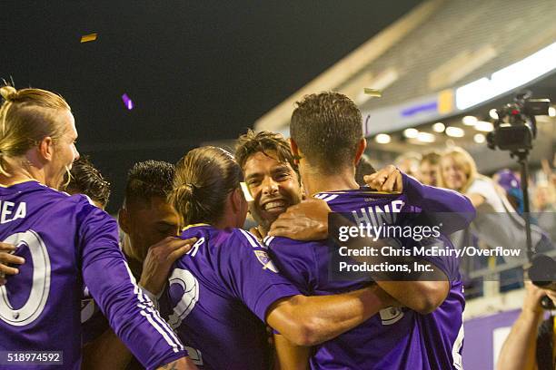 Kaka of Orlando City SC celebrates with his teammate after opening the scoring with an assist to Seb Hines against the Portland Timbers at Citrus...