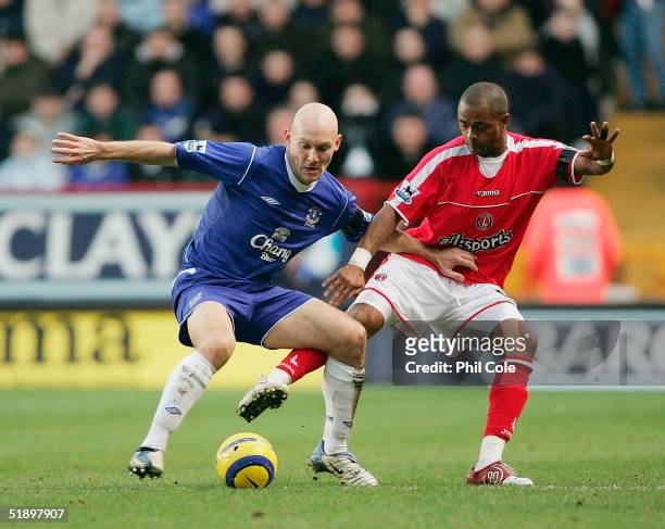 Shaun Bartlett of Charlton tackles Thomas Gravesen of Everton during the Barclays Premiership match between Charlton Athletic and Everton at The...