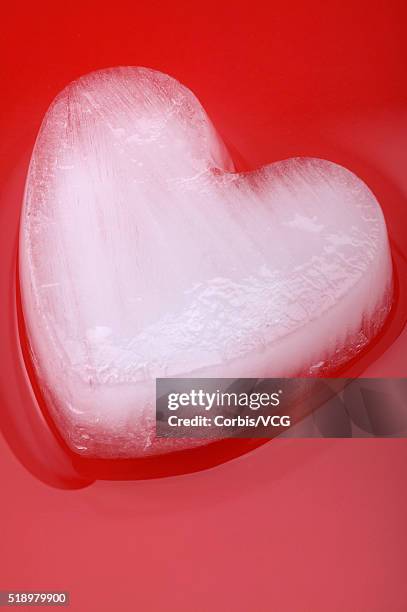 detail view of a heart-shaped ice cube - novelty item stock pictures, royalty-free photos & images