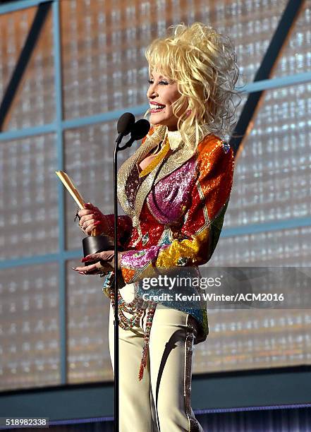 Recording artist Dolly Parton accepts the Tex Ritter award onstage during the 51st Academy of Country Music Awards at MGM Grand Garden Arena on April...