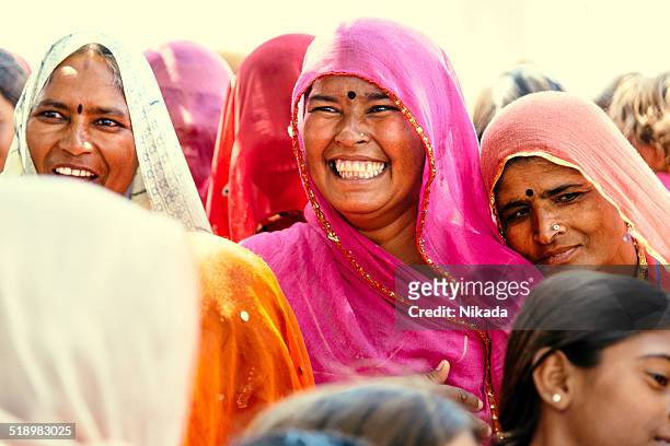 happy indian village women - rajasthani women stock pictures, royalty-free photos & images