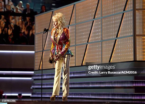 Recording artist Dolly Parton accepts the Tex Ritter award onstage during the 51st Academy of Country Music Awards at MGM Grand Garden Arena on April...