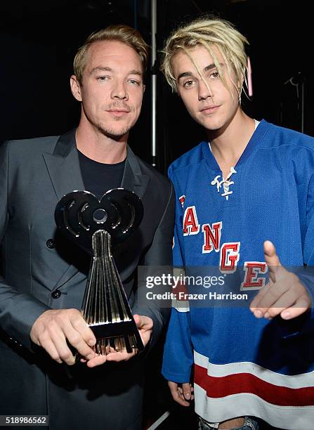 Recording artists Diplo and Justin Bieber winners of the award for 'Dance Song of the Year,' for 'Where are u now,' backstage at the iHeartRadio...